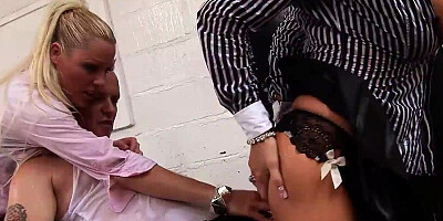 Two horny businesswomen fuck the worker at the car wash