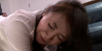 Korean MILF bends on the floor and gets shagged from behind