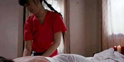 Asian masseuse and her white client have lesbian sex after a gentle body rubbing