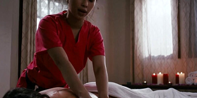 Asian masseuse and her white client have lesbian sex after a gentle body rubbing