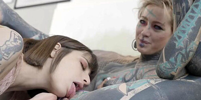 Inked lesbian girl spanks and dominates her lovely brunette girlfriend