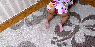 Milf kneels in a short dress and waits for anal sex