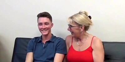 Busty grandma gives a nice handjob and gets fucked by pizza boy