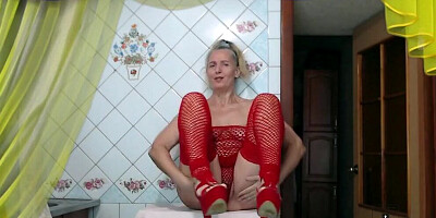 Sexy Lukerya changes into a red mesh outfit