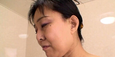 Her Japanese hairy snatch gets penetrated and creampied after a shower