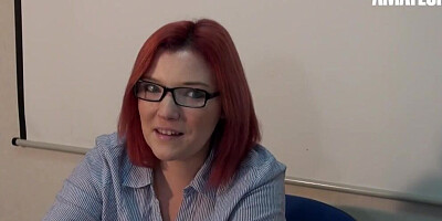 Classy office redhead with glasses dicked down on a desk