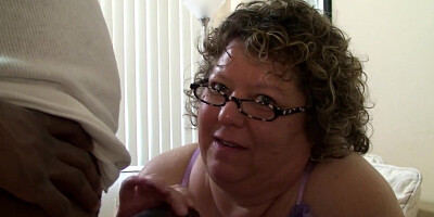 Cock-hungry mature woman deepthroats on cock while sucking it