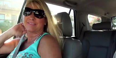 Busty big tits MILF flashes in public