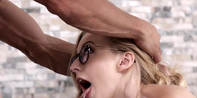 Blonde minx with glasses behaves very naughtily in the bedroom