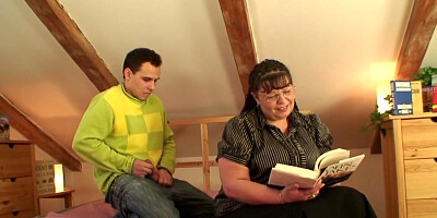 Older BBW reading a book before taking on a younger BWC