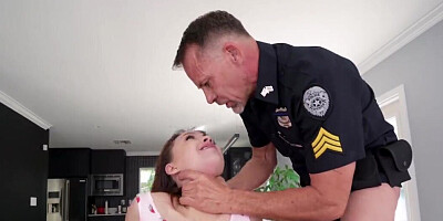 She ends up servicing both of the muscular policemen