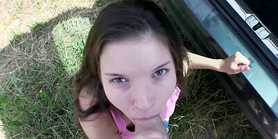 Sweet brunette girl sucks fat cock in a public place