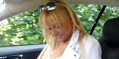 Charming blonde MILF is being ass-fucked in the car