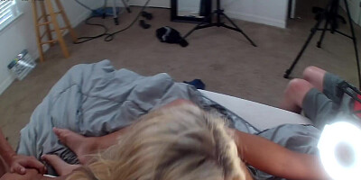 Blonde babe is filmed while pleasing two well-hung guys