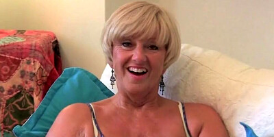 Chubby grandma is touching her big wet cunt on the camera