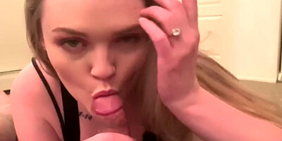 Blonde flirts with the camera while sucking and riding hard cock