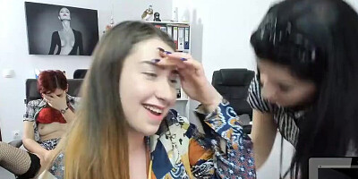 Lesbian girl enjoys while girlfriend massages her neck and shoulders