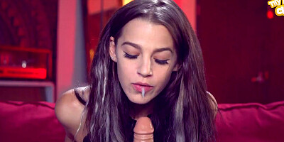 Solo brunette in black stockings is sucking off and riding the big dildo