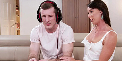 MILF cock-teases Brick Danger while he's playing some games