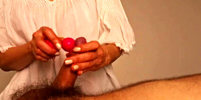 Naughty masseuse plays with dude's dick while giving him a massage