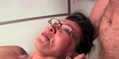 Naughty cougar professor is fucked by a horny student in the classroom