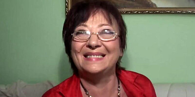 Stockings wearing German granny enjoys eating cum