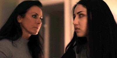 A brunette milf eating her busty lesbian stepdaughters pussy