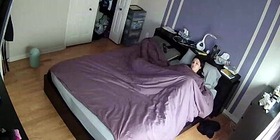 Horny housewife moans loudly while touching herself under the bed sheet