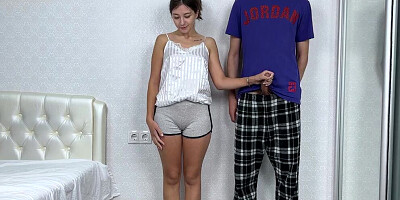 Charming girl is naked while giving her big stepbrother a handjob