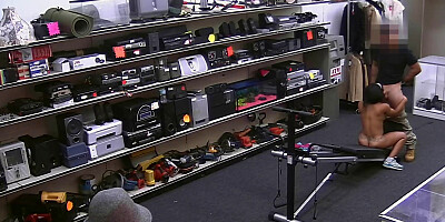 Muscled girl sucks a dick and gets fucked in the pawn shop