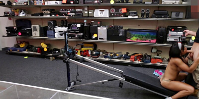 Muscled girl sucks a dick and gets fucked in the pawn shop