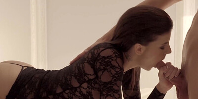 Young lady in sexy black top has erotic seance