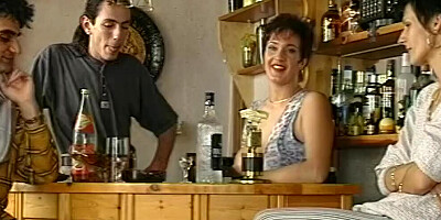 Mature woman is groped and fucked by two guys in a bar