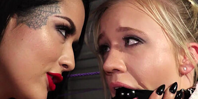 Mistress Katrina Jade is dominating bound and gagged Bailey Brooke
