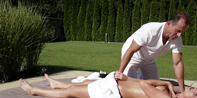 Blonde Czech has masseur's cock in her shaved pussy outdoors