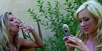 To prepare their asses for the intense threesome the two blondes eagerly finger their assholes