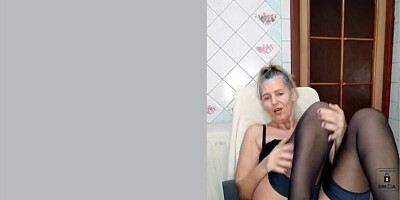 Splendid MILF in sexy black lingerie is cock teasing in solo video