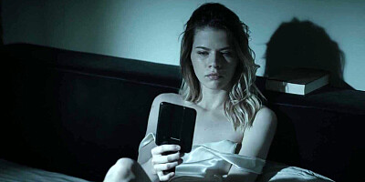 Cute girl studies her pussy in the mirror as she masturbates