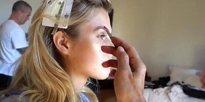 Enjoy a beautiful blonde fashion model while she's posing for a magazine photo-shoot