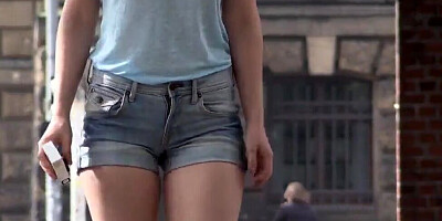 Naughty mom walks around in public without wearing a bra