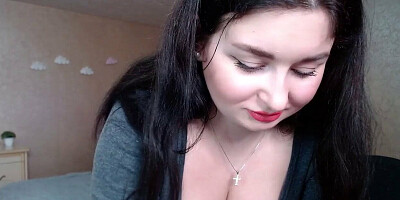 Curvy Russian hottie with black hair strips and shows her tits off