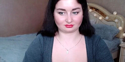 Curvy Russian hottie with black hair strips and shows her tits off