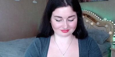 Curvy Russian hottie with black hair strips and shows her tits off