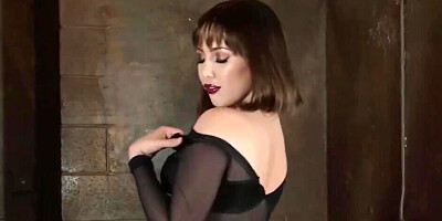 Beauty in latex boots seductively fingers own pussy
