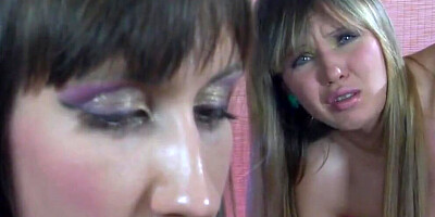 Lesbian dolls in stockings are using a giant strap-on for playing anal banging games