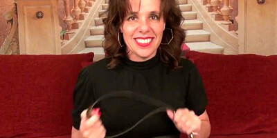 Horny mature lady is stripping and ramming her pussy with a dildo