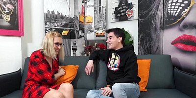 Tattooed MILF is having sex with her stepson on the couch