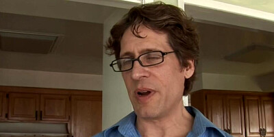 Bridgette B's massive tits are dangling while she receives a big cock