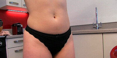 Busty amateur redhead teases with her panties