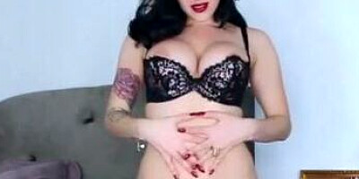 Elegant lady is talking dirty and giving JOI while posing in sexy black lingerie
